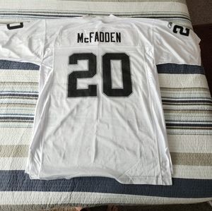 Brand new McFadden Raiders Jersey w/ ticket lanyard
